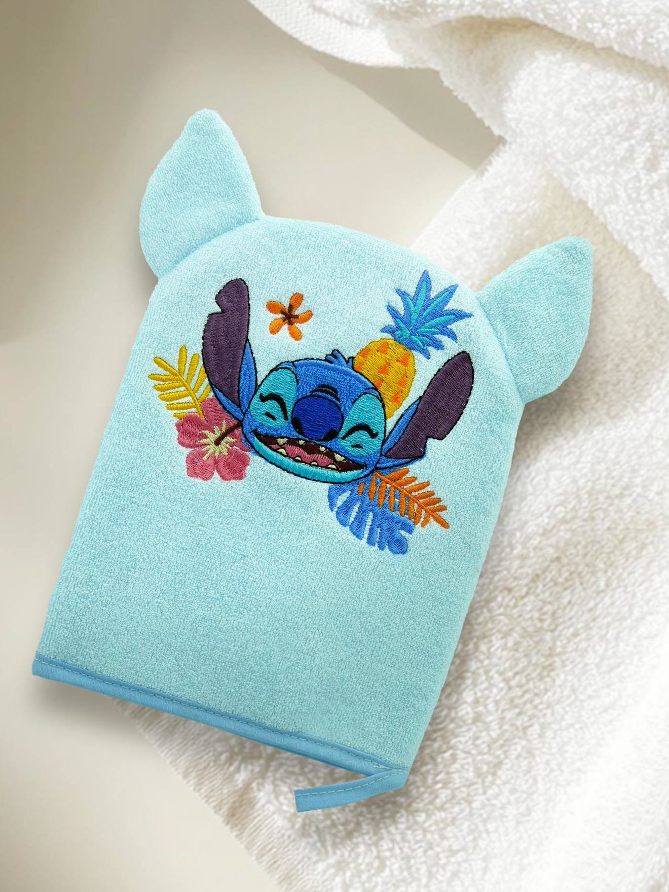 Gant de toilette Disney ludique brodé tête de Stitch bleu ciel